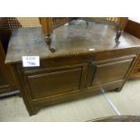 An 18c oak coffer with stained pine lid and panelled front est: £100-£150