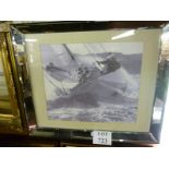 A framed photographic print of a yacht and crew at sea in a decorative mirrored glass frame est: