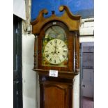 A 19c oak and mahogany long case clock with painted revolving ship dial eight day signed  Richard