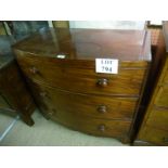 A 19c mahogany bow fronted chest of 3 long drawers with turned handles and splayed feet C1800 est: