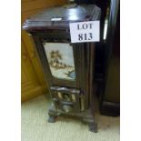 A decorative enamel fire stove with snowy scenes to sides est: £40-£60