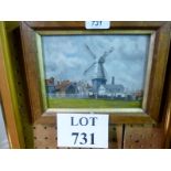 A small oak framed and glazed oil on board study of Cranbrook Windmill signed Phillip Russell lower