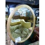 A late 19c gold reeded oval mirror est: £30-£50