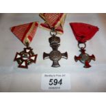 A collection of three medals 1849 and 1916 (two with red enamelling) est: £40-£60