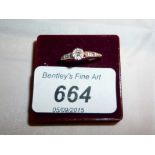 A three stone diamond ring boxed (size P) est: £100-£200