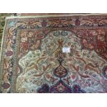 A large wool rug with central medallion (265 x 180 cm approx) est: £100-£150