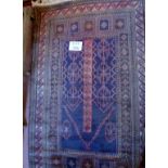 A 20c Persian rug in good condition (5' x 3' approx) est: £40-£60