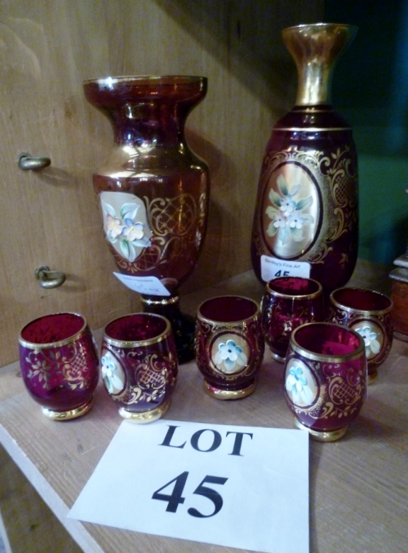 A Bohemian ruby glass liqueur set for six and a flower painted vase est: £15-£25 (B12)