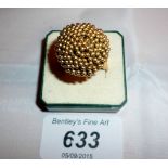 A 14ct gold ball shaped ring (size N) est: £200-£400