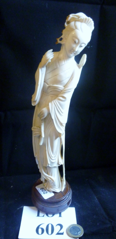 A carved ivory figure of a Geisha Girl est: £100-£200 (M)