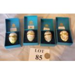 A set of four Halcyon Days enamel Easter egg dated 1974-1977,