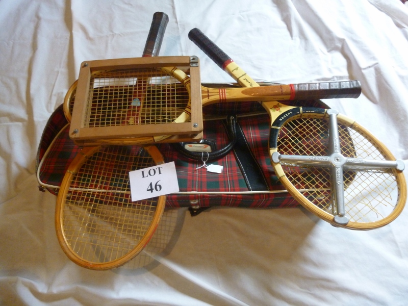 A Slazenger tennis bag containing three wooden rackets est: £30-£50 (BB35)