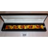 A silver and amber bracelet boxed est: £400-£500