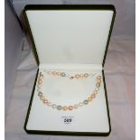 Natural shell pearl necklace (11 mm round) lobster claw clasp boxed est: £55-£85
