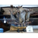 A wooden model galleon with cloth sails est: £25-£45 (AB11)