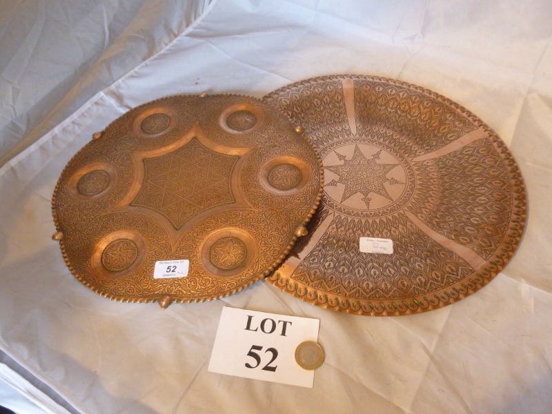 Two decorative engraved Middle Eastern copper salvers est: £25-£45 (B36)
