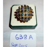 A 14ct gold large sapphire cluster ring (size O) est: £200-£400