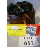 A pair of binoculars and a pair of opera glasses est: £20-£40 (F19)