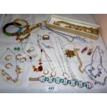 A large collection of mainly retro jewellery to include an enamelled orchid necklace and a pair of