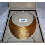 A fine 18ct gold boxed Garrard & Co London necklace formed of 26 rows of 18ct gold herring bone