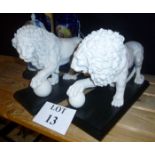 A pair of well carved lions after the Medicci lions on slate plinth bases est: £120-£180 (A2)