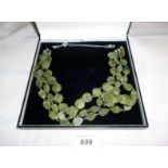 A three row jade necklace boxed est: £70-£100
