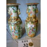A pair of Canton export Famille Rose vases decorated with figural panels est: £150-£250 (A1)