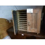 A 19c rustic pine table top filing cupboard with twenty pigeon holes est: £30-£40