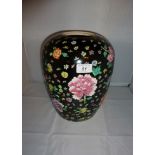 A large Chinese vase with a black background and flowers est: £30-£50 (B34)