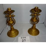 A pair of ship's gimbal candlesticks est: £25-£50 (B36)