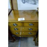 A pretty c1900 oak chest with two short drawers over two long with brass handles and terminating on