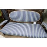 A late Victorian ebonised two seater sofa upholstered in blue est: £100-£150