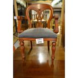 A mid - late 20c set of Victorian style dining chairs upholstered in blue and bearing a label for