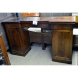 A 19c mahogany break front pedestal sideboard with three blind drawers over cupboard est: £50-£80