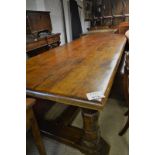 A large solid oak refectory dining table the base believed to have come from Robert Thompson's