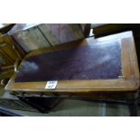 A Victorian mahogany writing table with inset leather top (worn) over two drawers est: £80-£100