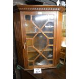 A 19c mahogany corner wall cupboard with astral glazed door est: £30-£50