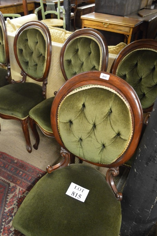 A set of six Victorian mahogany balloon back dining chairs upholstered in green est: £100-£150