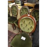 A set of six Victorian mahogany balloon back dining chairs upholstered in green est: £100-£150