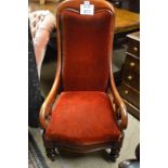 A Victorian pale mahogany armchair upholstered in red velvet est: £80-£120