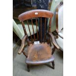 A 19c elm seated country armchair est: £40-£60