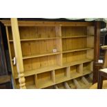 A large pine haberdashery unit with open shelves above smaller compartments (6' 6" high x 7' long