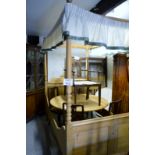 A 19c pine four poster bed (4 ft wide) with panelled head and foot board est: £200-£400