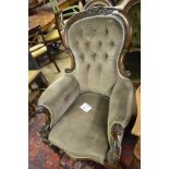 A Victorian mahogany framed gentleman's spoon back armchair upholstered in mink material est: