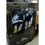 A 20c Japanese lacquered cupboard with applied carvings depicting figures and trees est: £80-£120