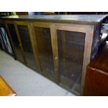 A long glazed bookcase with three doors c1900 est: £80-£120