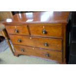 A 19c mahogany chest of two short over two long drawers with turned handles and ivory escutcheons