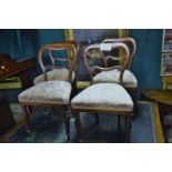 A set of four Victorian mahogany balloon back dining chairs est: £150-£180