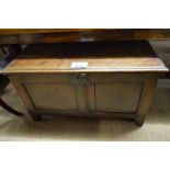 An 18c oak panelled coffer with lift up lid and in good condition est: £120-£160