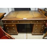 A Victorian oak pedestal partner's desk with tan leather top and wooden knobs c1870 est: £1,000-£1,